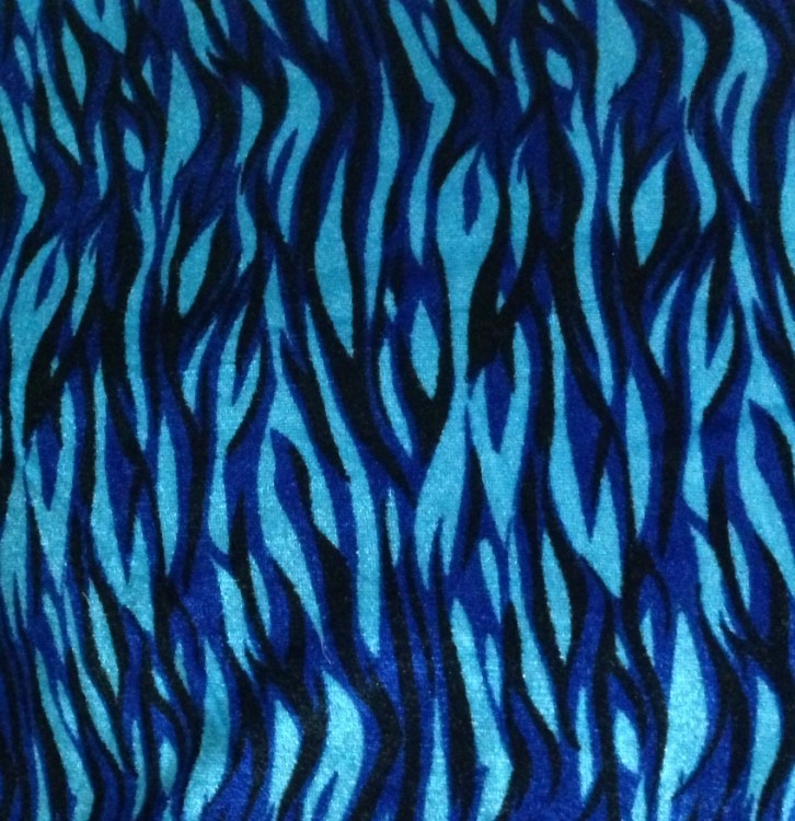 this is a picture of Turquoise tiger printed velvet fabric