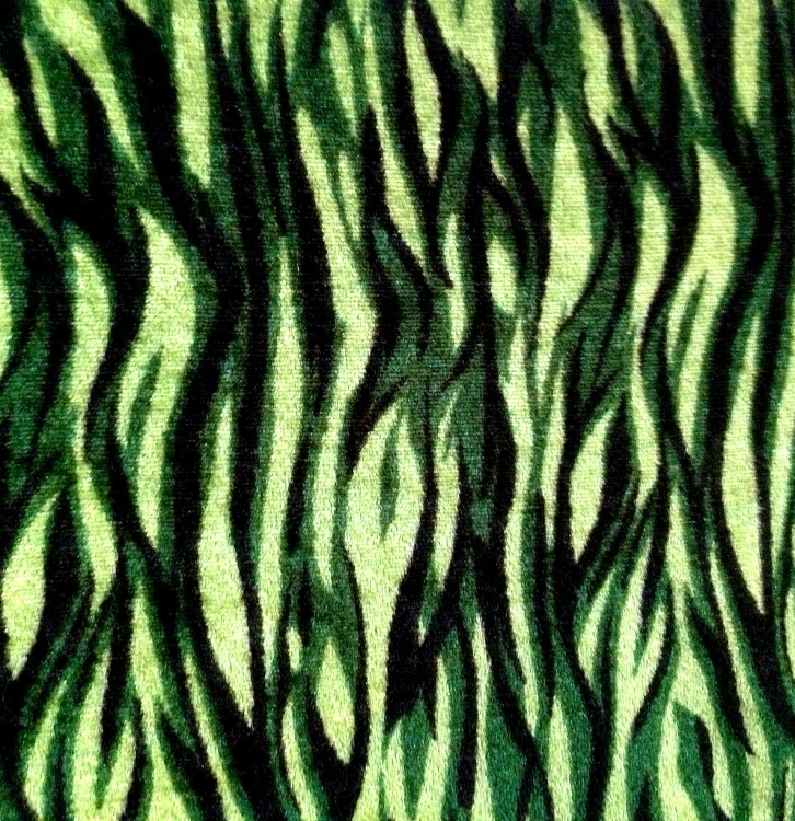 this is photo of green tiger printed velvet fabric