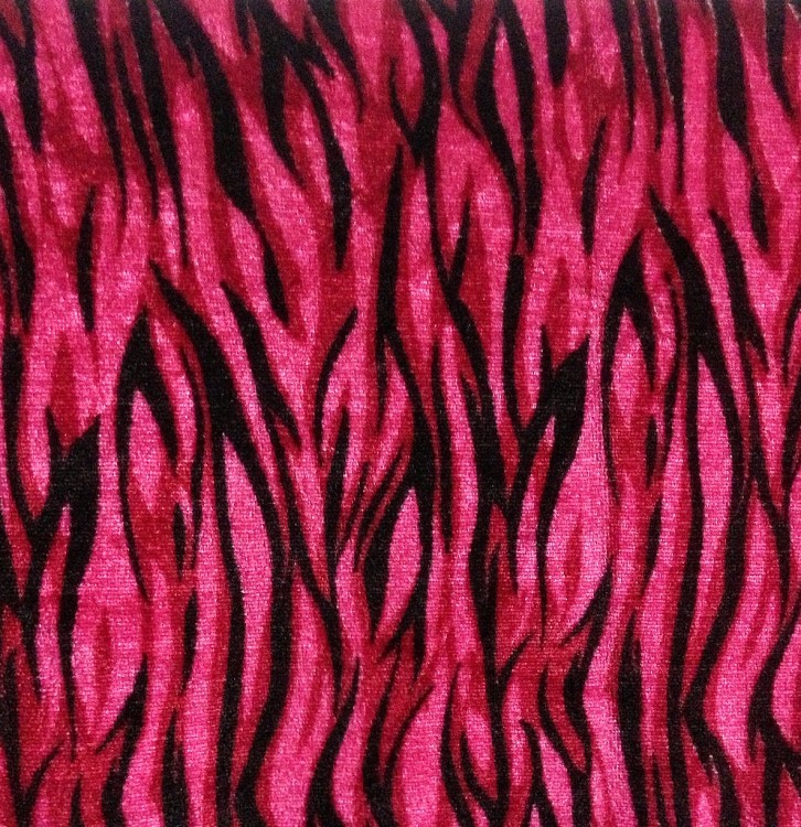 this is a picture of Red tiger printed velvet fabric
