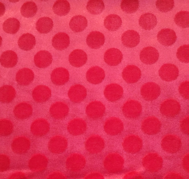 Embossed velvet fabric in Red polka dots